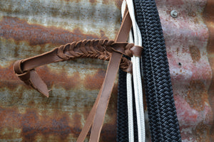 Loping hackamore: dark and light grey rope nose band "A"