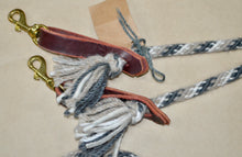 Loop rein: Dark grey, cream and tan in the  "snake skin" pattern.