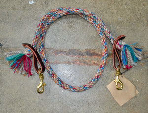 Loop reins: Taupe, pink, orange and two tones of blue in the "Lollipop"  pattern. Small.