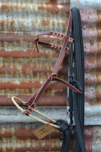 Californian loping hackamore with rawhide 4 plait noseband and black loping reins. Latigo leather headstall